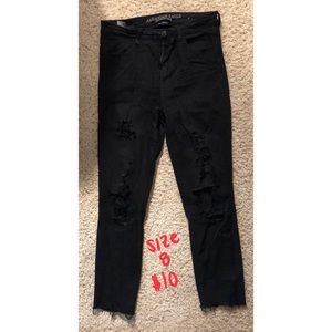 Distressed black high waisted jeans